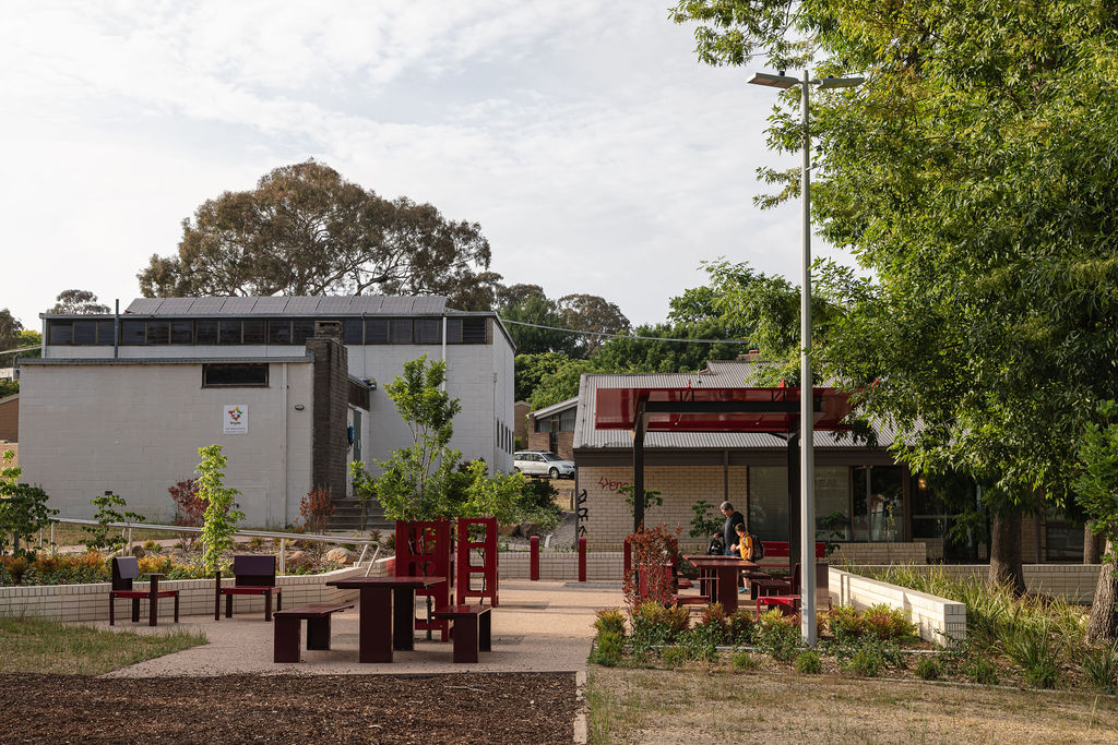 Seating, gardens and paths at Campbell Shopping Centre.