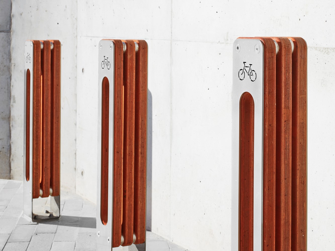 Timber and metal bicycle parking stands at Denman Local Centre