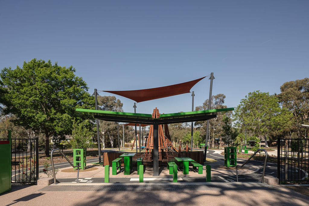 Sheltered picnic tables and seating at Duffy Shopping Centre.