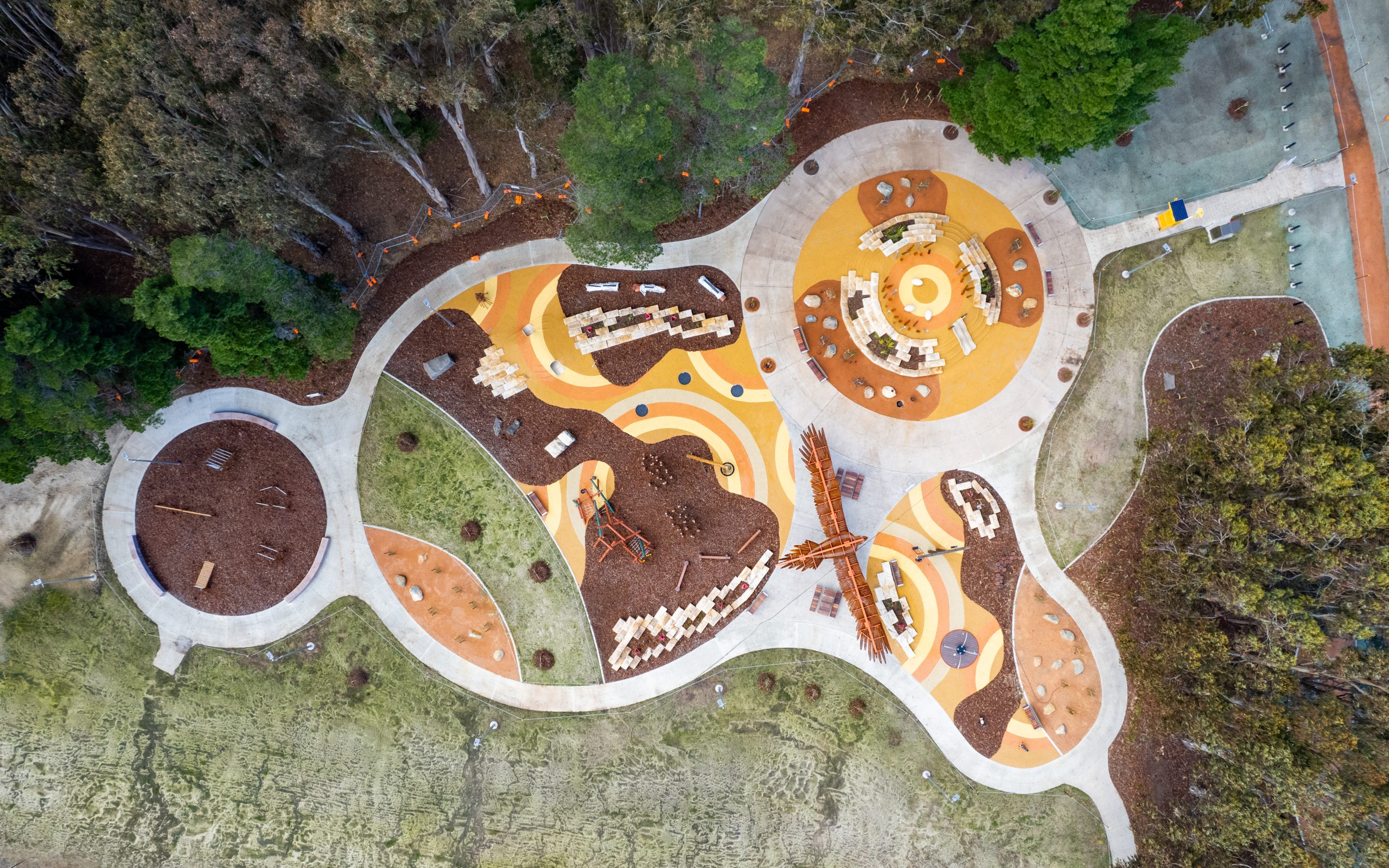 Overhead view of Maliyan Park’s play areas, paths and gathering spaces, July 2024.