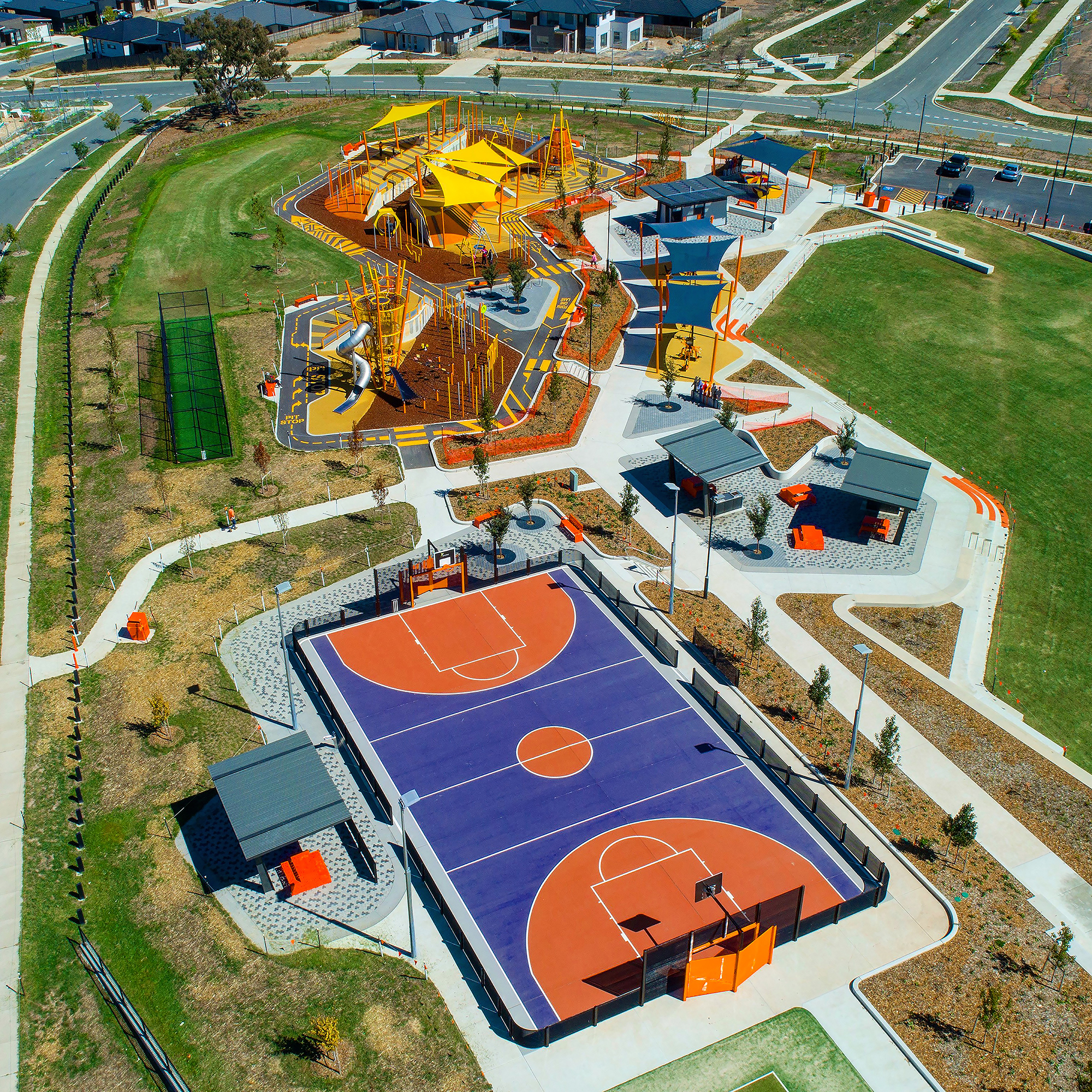 Aerial view of Moncrieff’s recreation park, showing ball courts, play areas and open lawns.